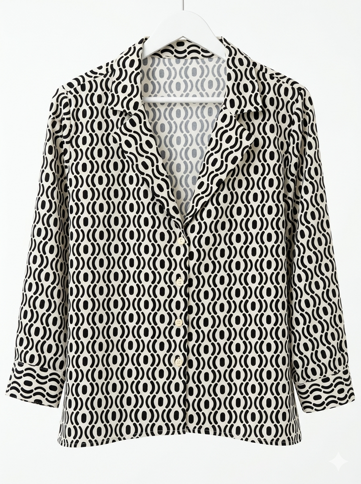 Button-down shirt blouse with a notched collar lapel and cuffed sleeves